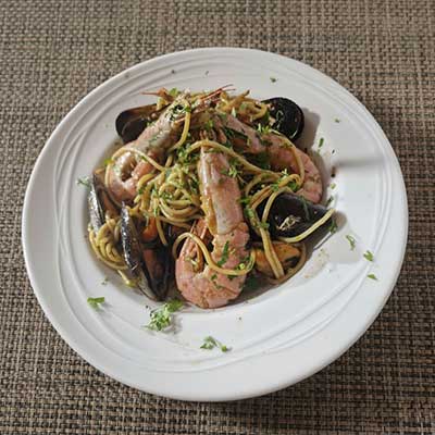 Disfruta de una deliciosa pasta con mariscos frescos en El Fogón Mallorca, en Palma de Mallorca.